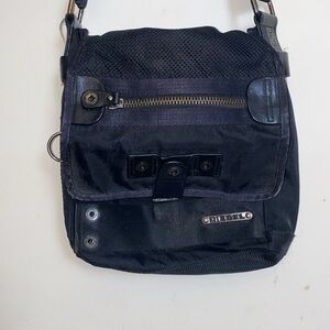 Up for sale, this beautiful Black unisex diesel messenger bag in great condition